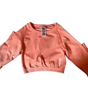 Pink Gymshark cropped workout shirt